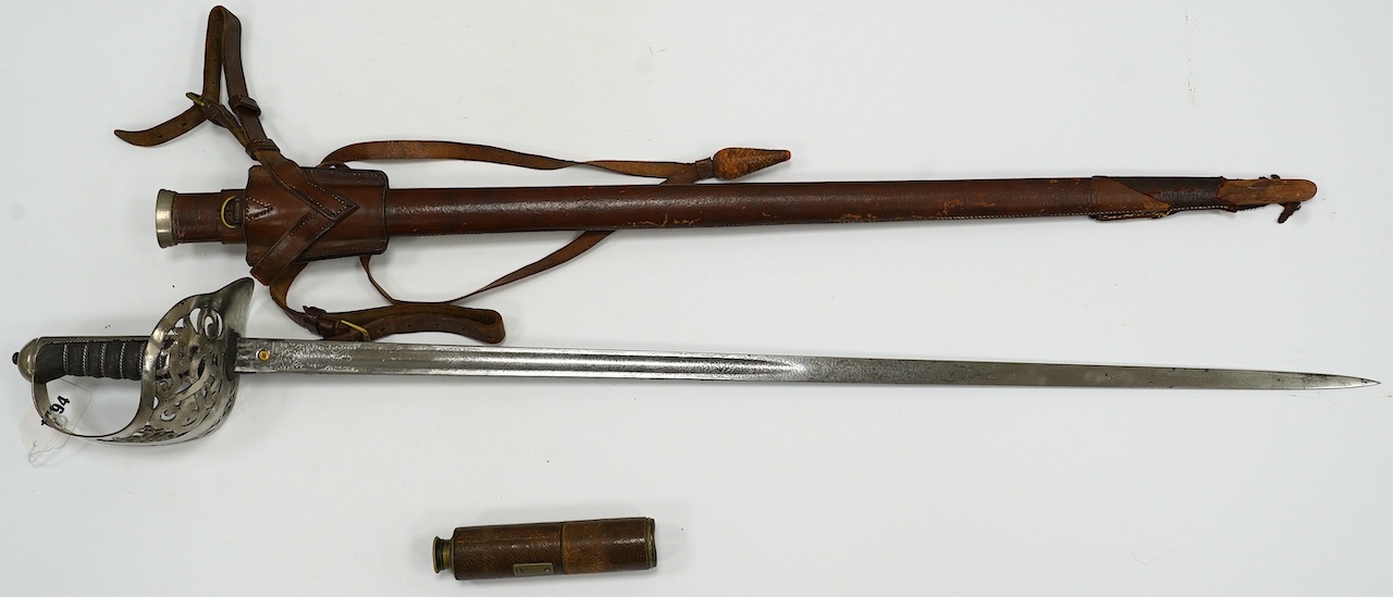 An 1895 pattern infantry officer’s sword by Wilkinson, proof number 34431, blade 82cm, in it’s leather field service scabbard with hangers and sword knot, with supporting research confirming that it was purchased by the